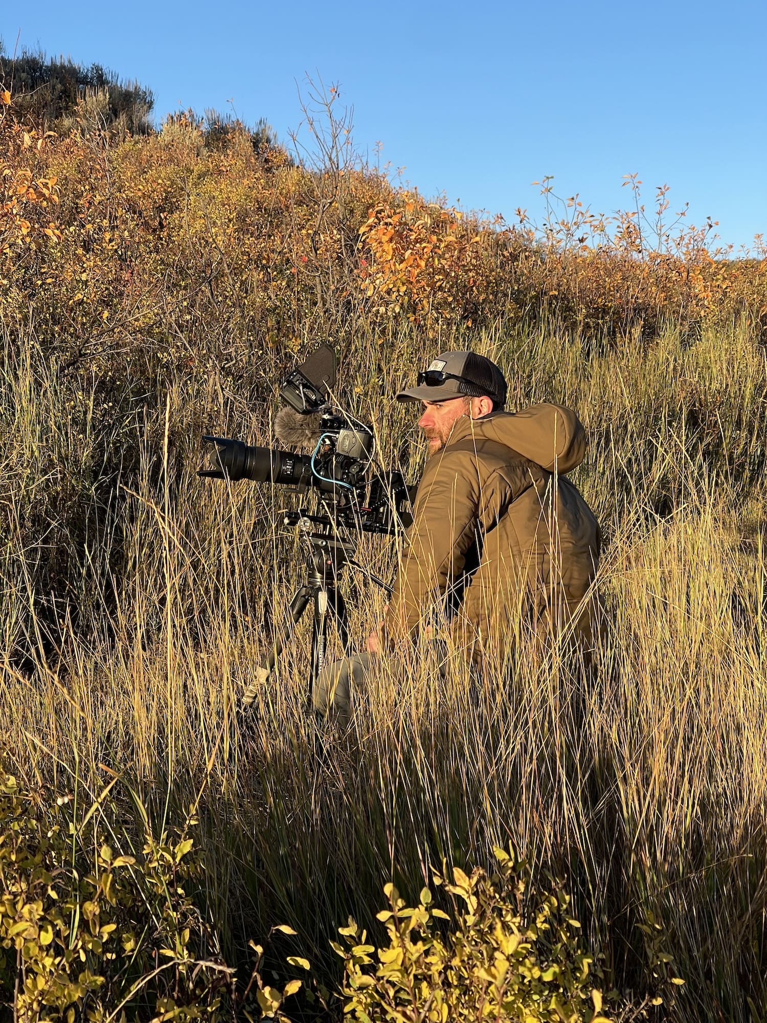 Billy Krueger photographing in the field. Photo Courtesy Billy Krueger