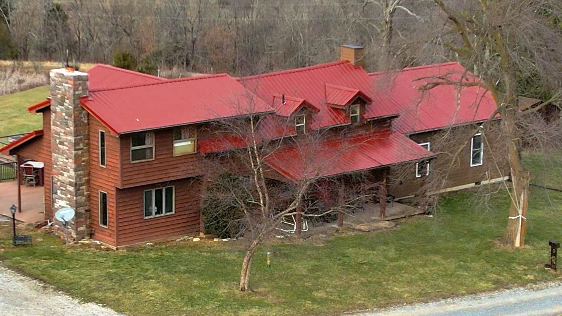 log cabin with red roof