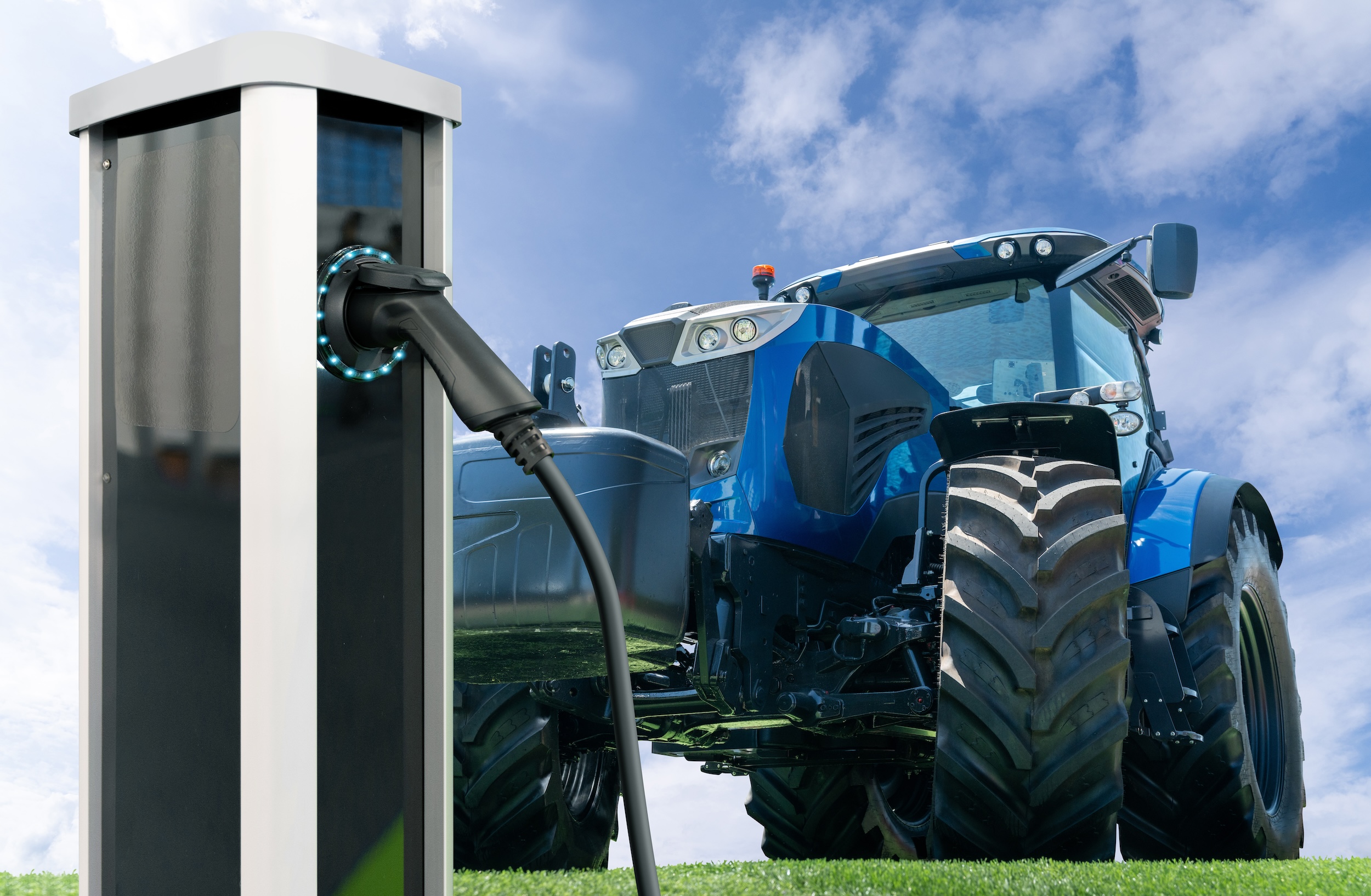 blue electric tractor charing