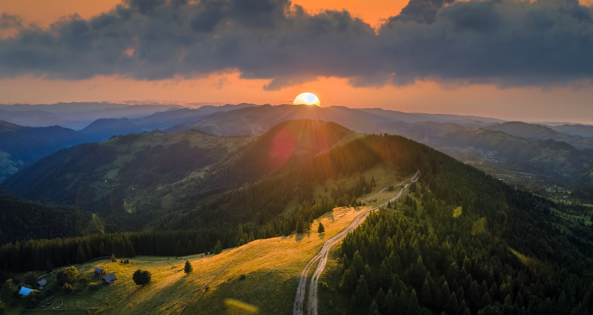 aerial view of one of the most scenic and best states to buy land in the us with rolling mountain views