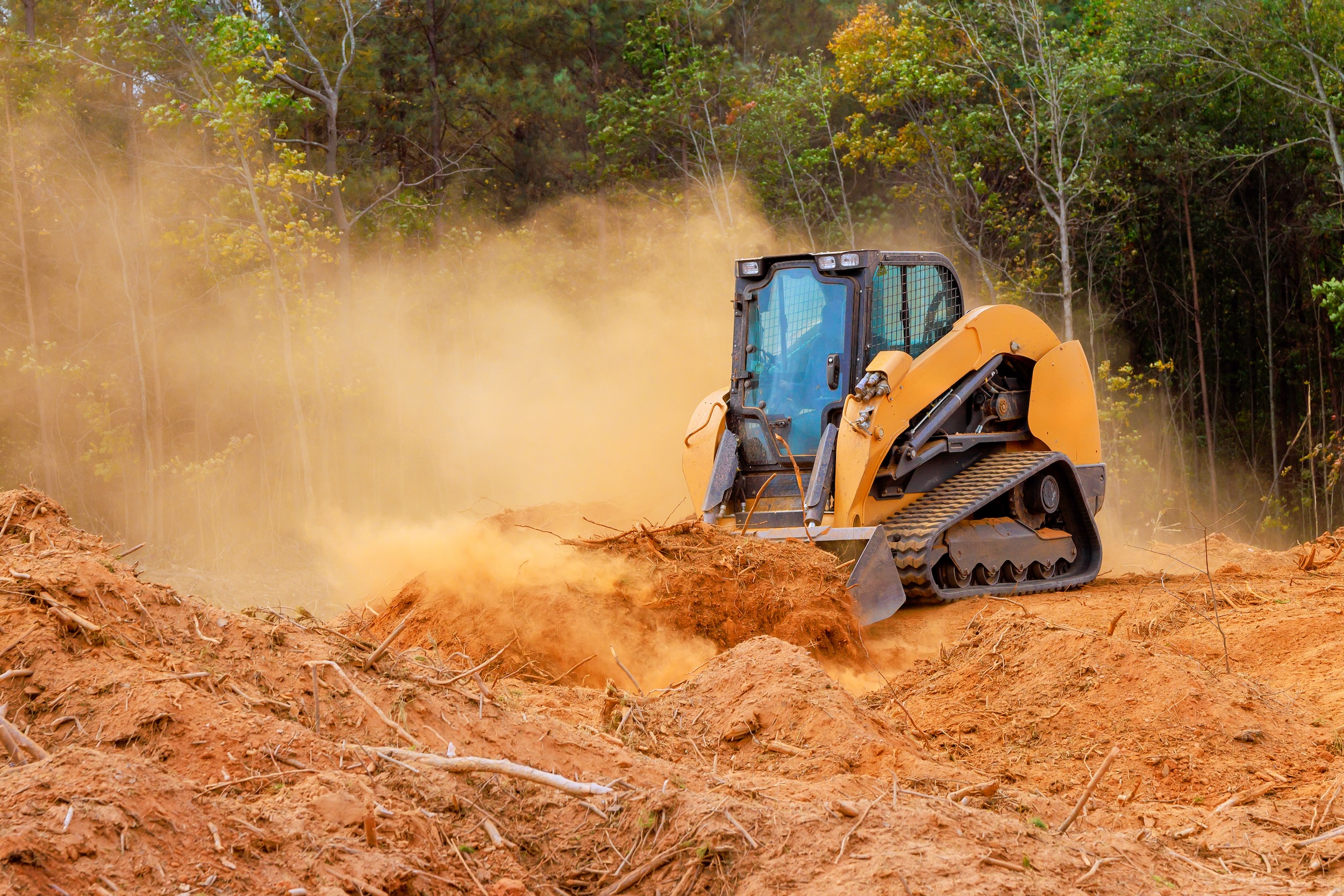 bulldozer showing how to clear land for building construction