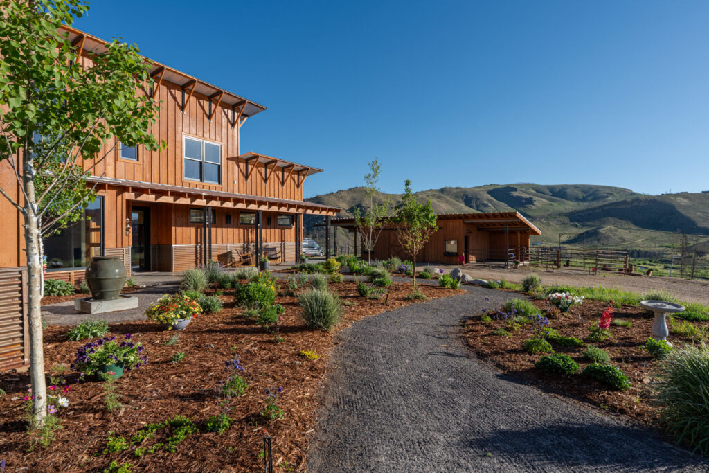 wooded exterior of a ranch style home in the foothills in Colorado represented by a good Hayden Outdoors real estate agent
